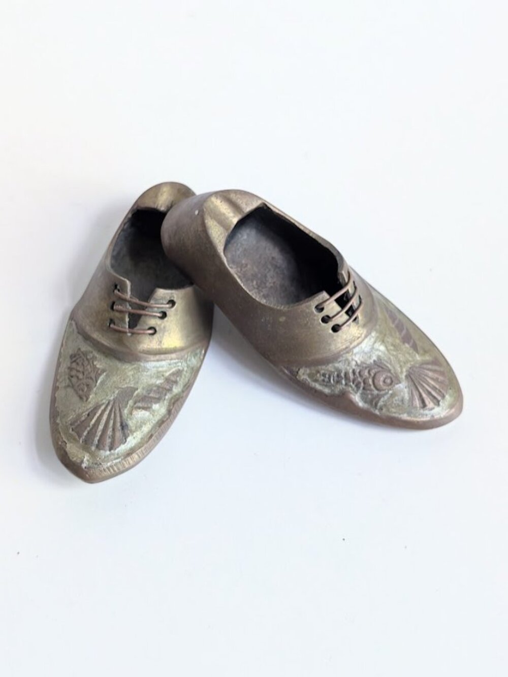 Pair of Vintage Mini Brass Shoe Ashtrays with Shell Fish Pattern